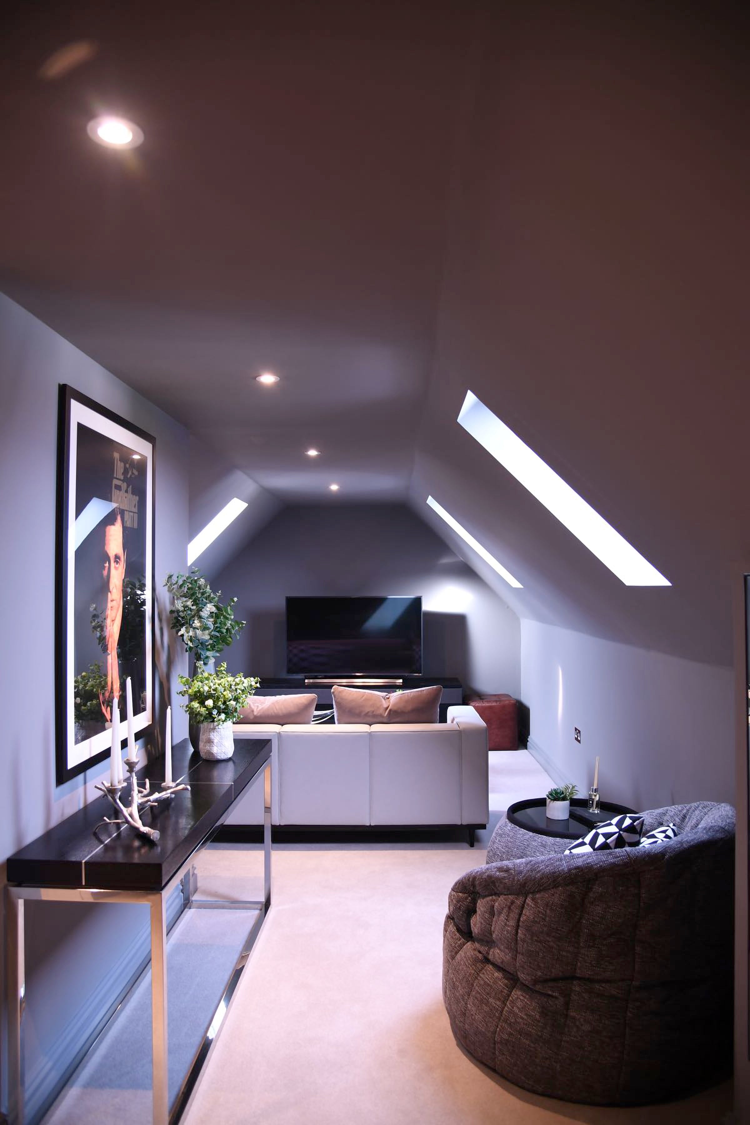 Butterfly Sofa and Versa Table bean bags in Luscious Grey in the attic of a Middlesex suburban home designed by Samantha Pope Interiors