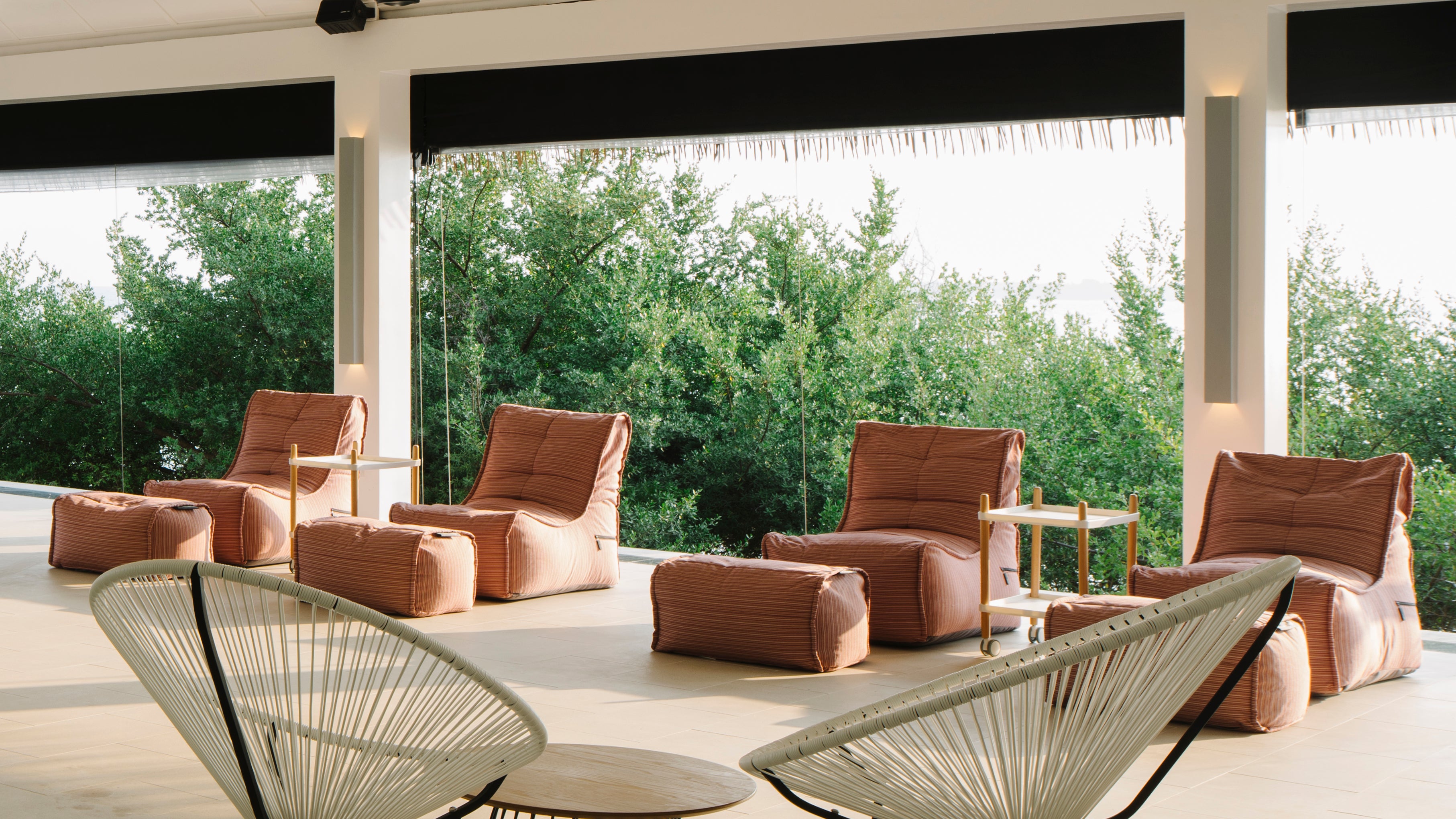 Evolution Sofa and Ottoman bean bags in Raspberry Polo at Thari Bar in Noku Maldives Resort.