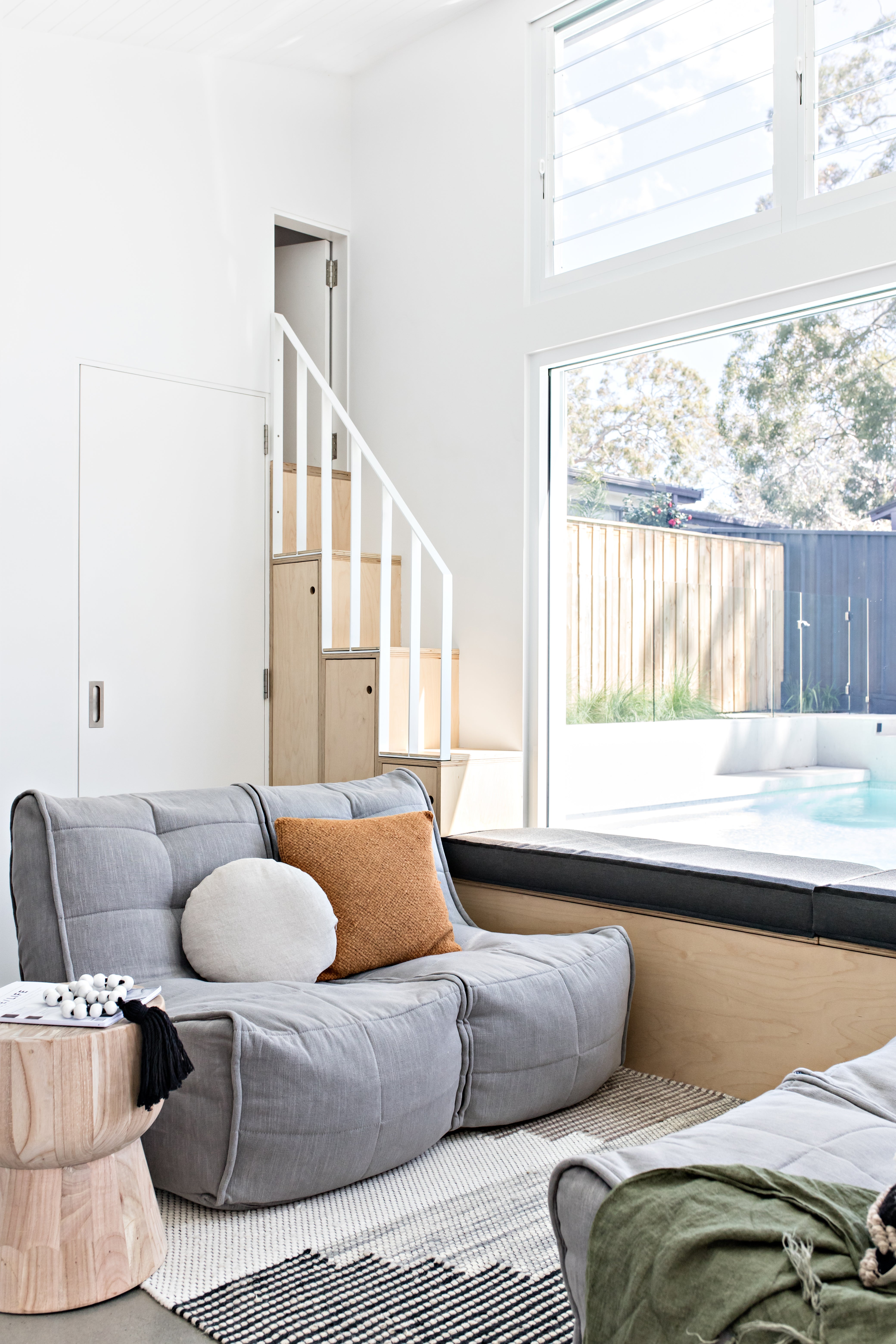 Twin Couch in Keystone Grey beside window in small living room