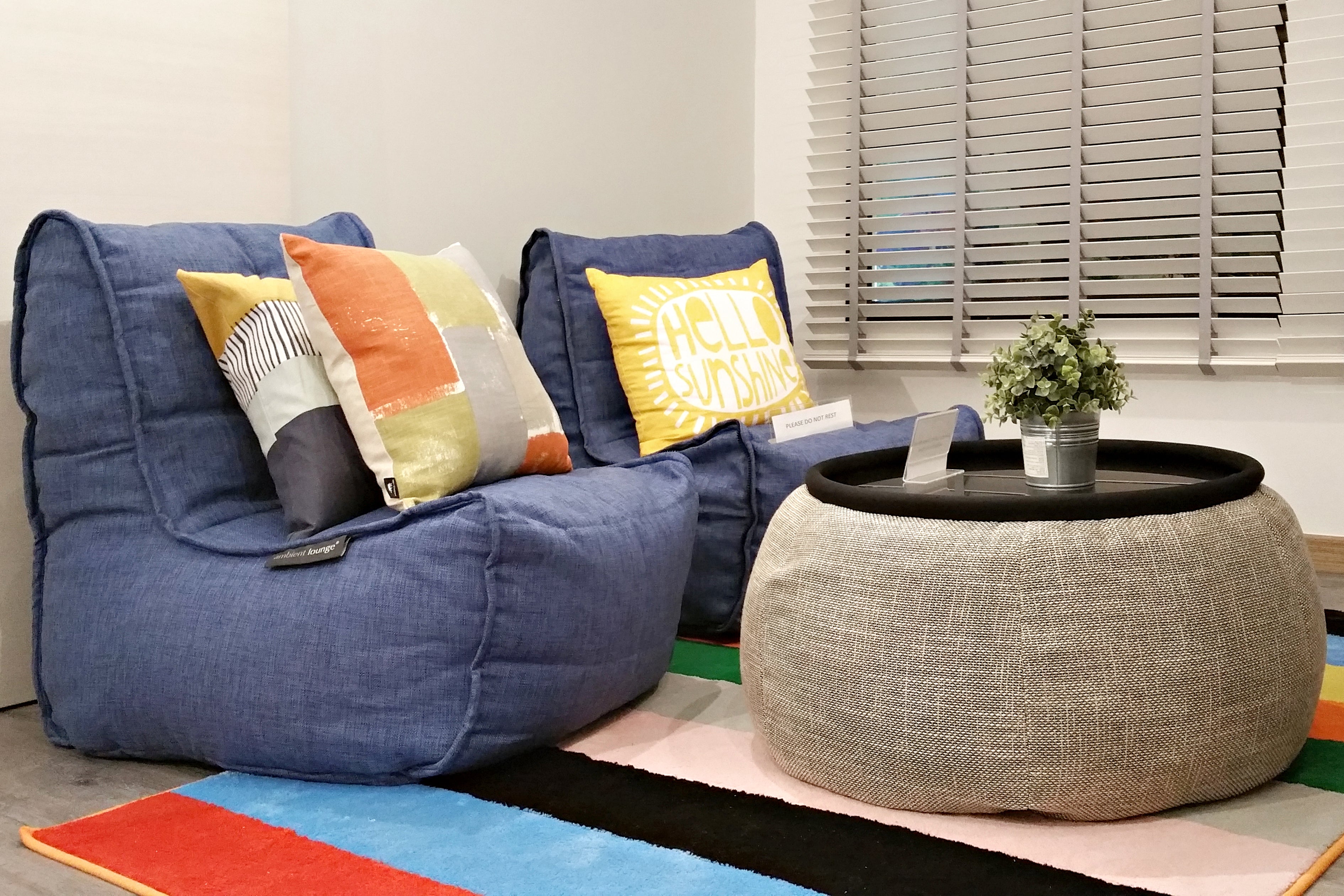 Twin Couch in Blue Jazz and Versa Table in Eco Weave.